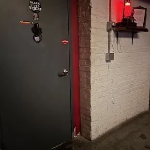 Entrance to get in. Informational paper next to the lamp on how it works.