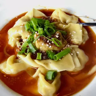 43. Pork Dumplings in Szechuan Chili Sauce