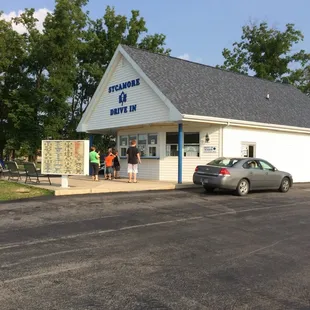 a car parked in front of a store