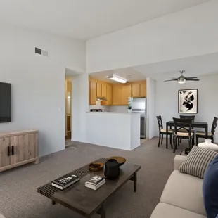 1 bed , upstairs, view from living room into dining and kitchen area