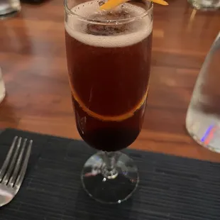 Bourbon and champagne fancy cocktail. Cannot recall the name but the combination is not to be slept on