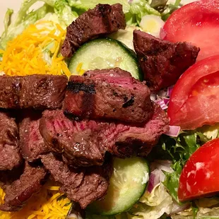 Steak Cobb minus blue cheese and added cheddar and cucumbers