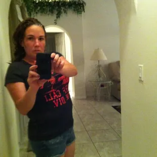 a woman taking a selfie