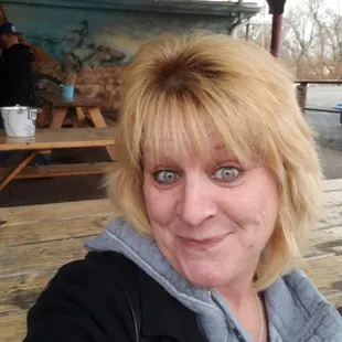 a woman taking a selfie
