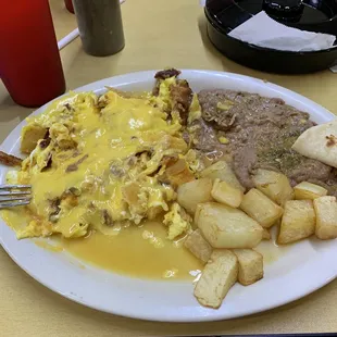 Pancho&apos; Special - migas with cheese and bacon