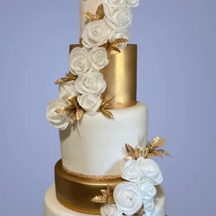 Elegant White and Gold Wedding Cake.