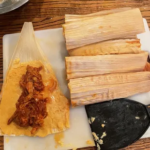 Rolling up tamales