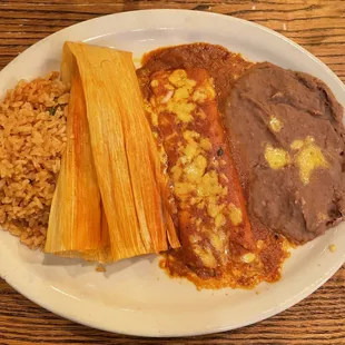 Cheese Enchilada, pork tamale, rice, and beans