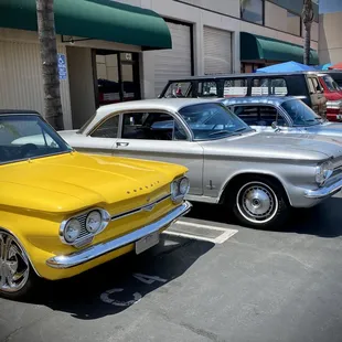 Corvairs in parking lot