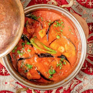 a pot of stew with vegetables