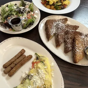 Crunchy French toast, veggie omelet with side salad and the veggie bowl with vegan eggs