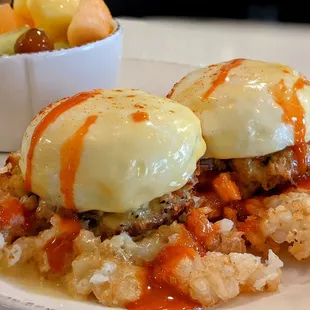 The Maryland! Crab Cake eggs Benedict over a bed of smashed Tater Tots.