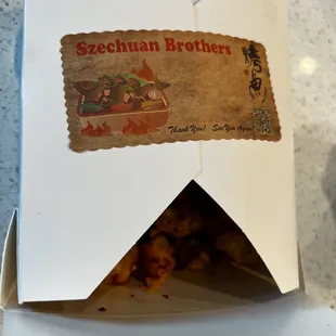 Chong Qing Hot Chicken. Thoughtfully packaged to not let it get soggy.