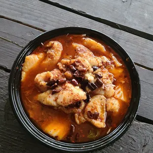 Fish filet in spicy gravy. Not spicy