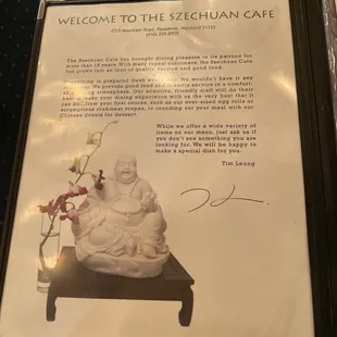 a picture of a smiling buddha