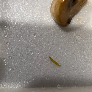 a glazed donut with a bite taken out of it