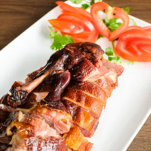 a plate of meat and vegetables