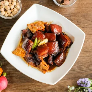 a plate of meat and vegetables