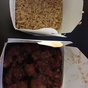 General Jou&apos;s Chicken with fried rice as delivered to my hotel. Appreciated that they included a plate and silverware