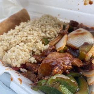 Combo pepper steak entree  with brown fried rice and egg roll.