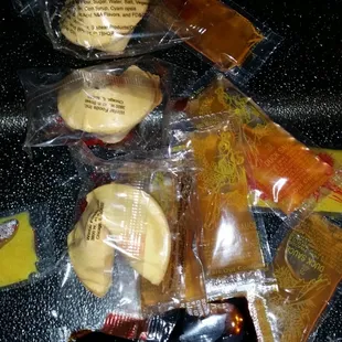 Duck sauce, Soy Sauce, Hot Mustard and Fortune Cookies.