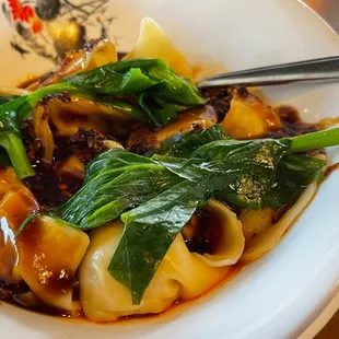 Garlic chili oil dumplings, good taste $10.