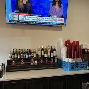 a television with a news anchor on it