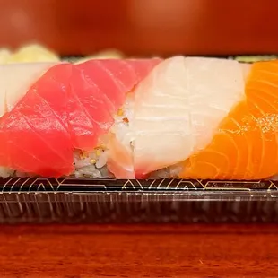 sushi in a plastic container