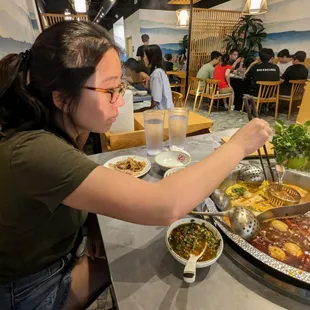 Inside. Two-flavor hot pot, a.k.a. &quot;Yin-Yang.&quot;