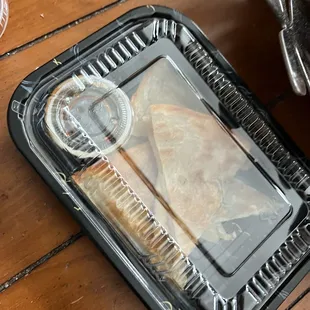 a sandwich in a styrofoam container