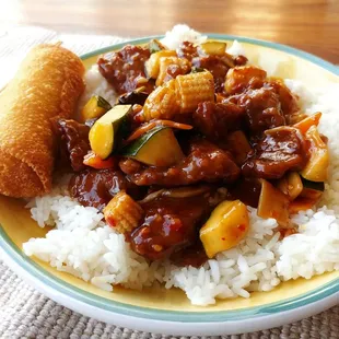 a plate of rice and meat
