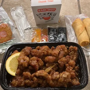 Orange Chicken, white rice, spring rolls, almond cookies
