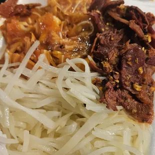 Cold dishes: pickled shoestring potato, marinated sliced beef, and marinated pigs ear