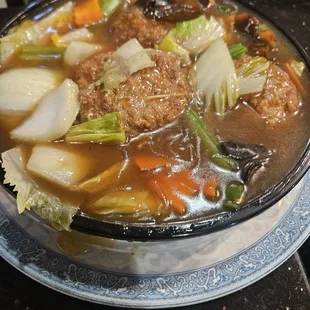 Stewed Lion&apos;s head meatballs with glass noodles on the bottom