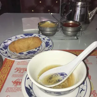 The beginning of my lunch special. Delicious hot and sour soup and an egg roll.