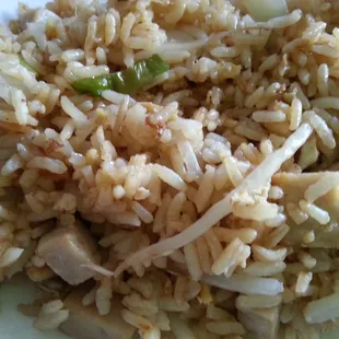 Chicken fried rice...  Great tasting but I've never seen anyone use processed chicken before,  spongy chicken cube meat?