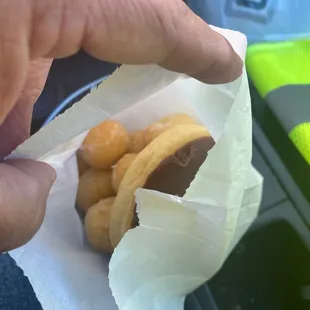Donut holes and chocolate glazed donut
