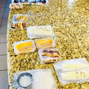 a counter with a variety of food items