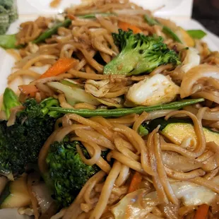 a plate of noodles and vegetables