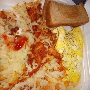 Burnt hash browns uncooked omelette