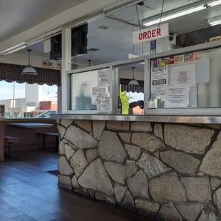 a stone counter and a vending machine