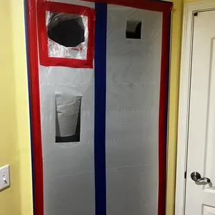 The affected room was closed off and sealed to ensure containment before any demolition work began.