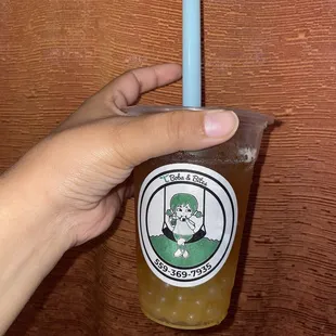 Small Peach Tea with Lychee popping boba. Rating: 8/10 (little too sweet but still good)