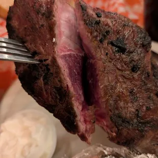 Burnt on the outside and raw in the middle.