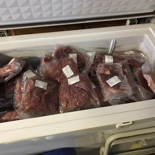 Full freezer! Many cuts of pork, mostly showing sausage( the last to be unpacked) hams and bacon also abundant