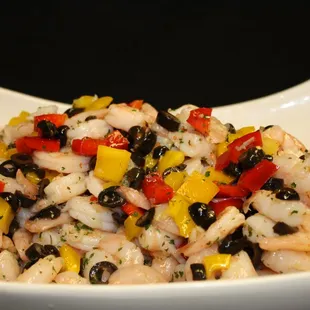 a bowl of shrimp and vegetables