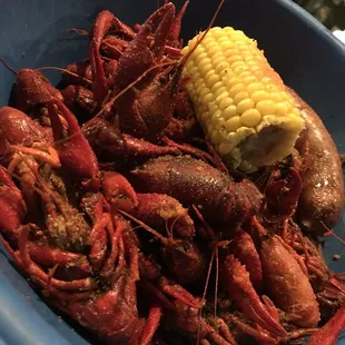 a bowl of craws and corn