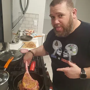 a man cooking in a kitchen