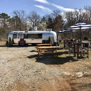 a camper and picnic table