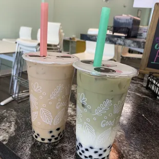 two cups of bubble tea on a table